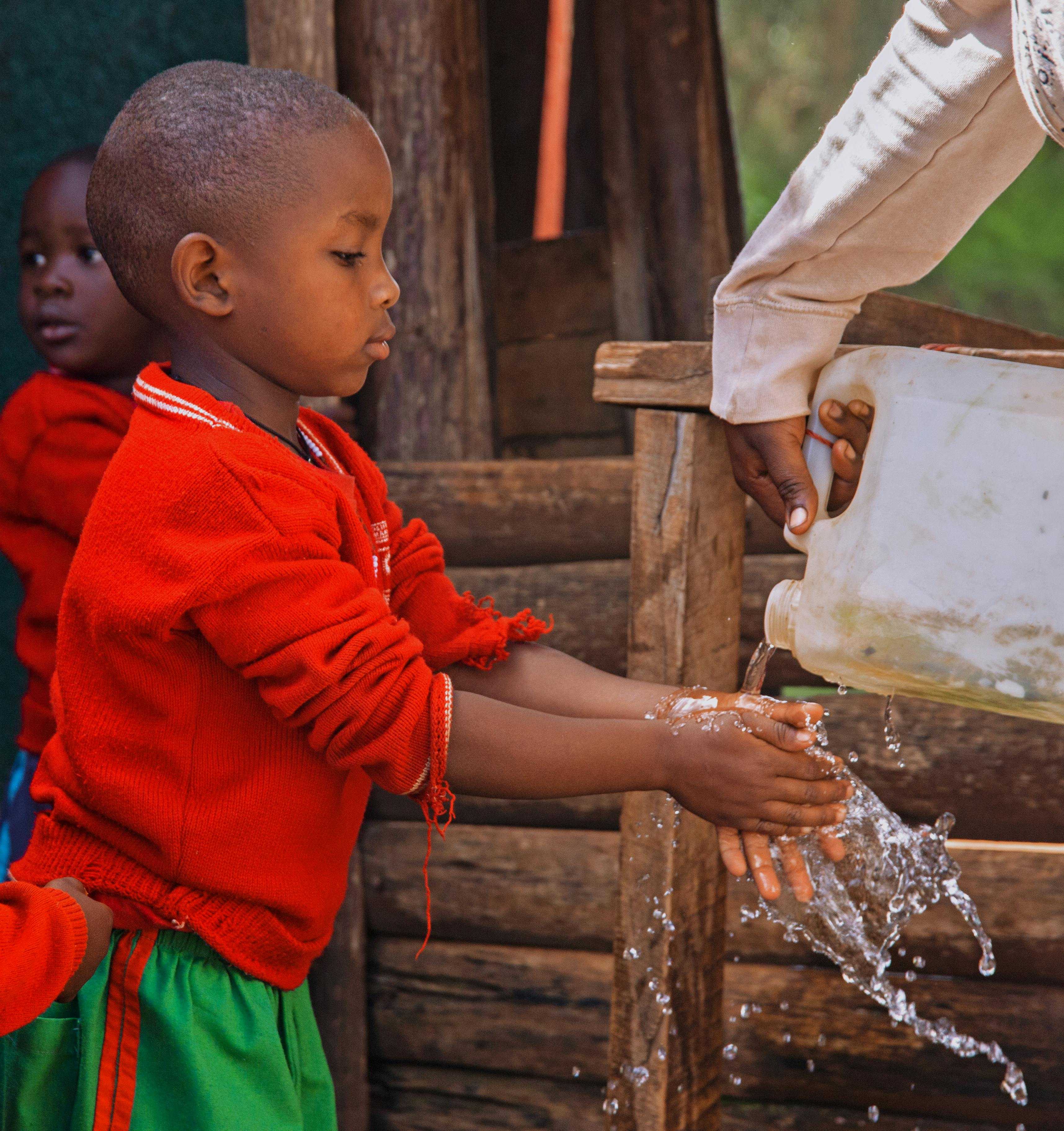 Child washes hands Child washes hands