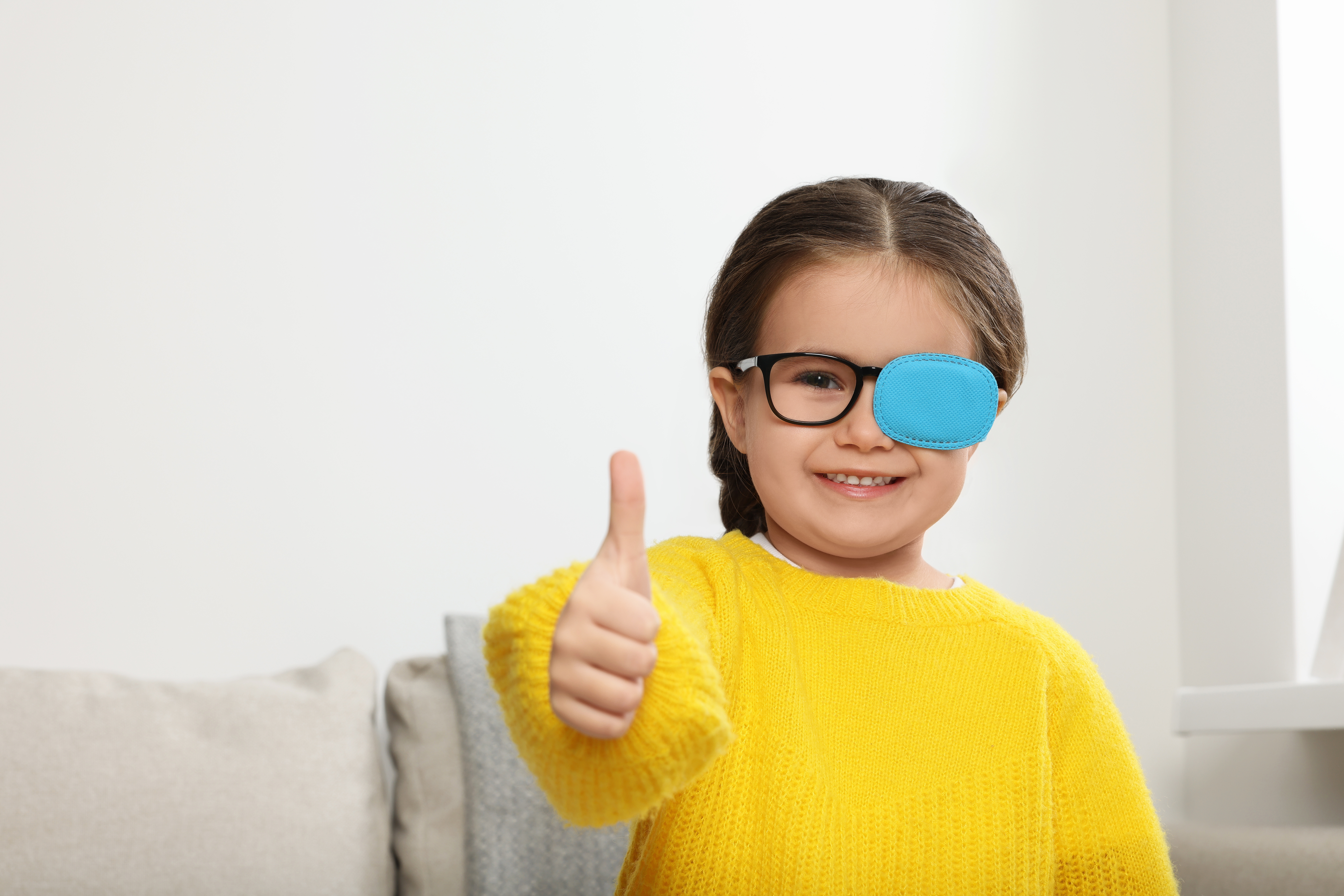 Child with eye patch for visual therapy Eye patching is one form of treatment for strabismus in children.